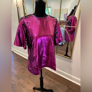 Fun sequin top! Size small. Missing a button on back.